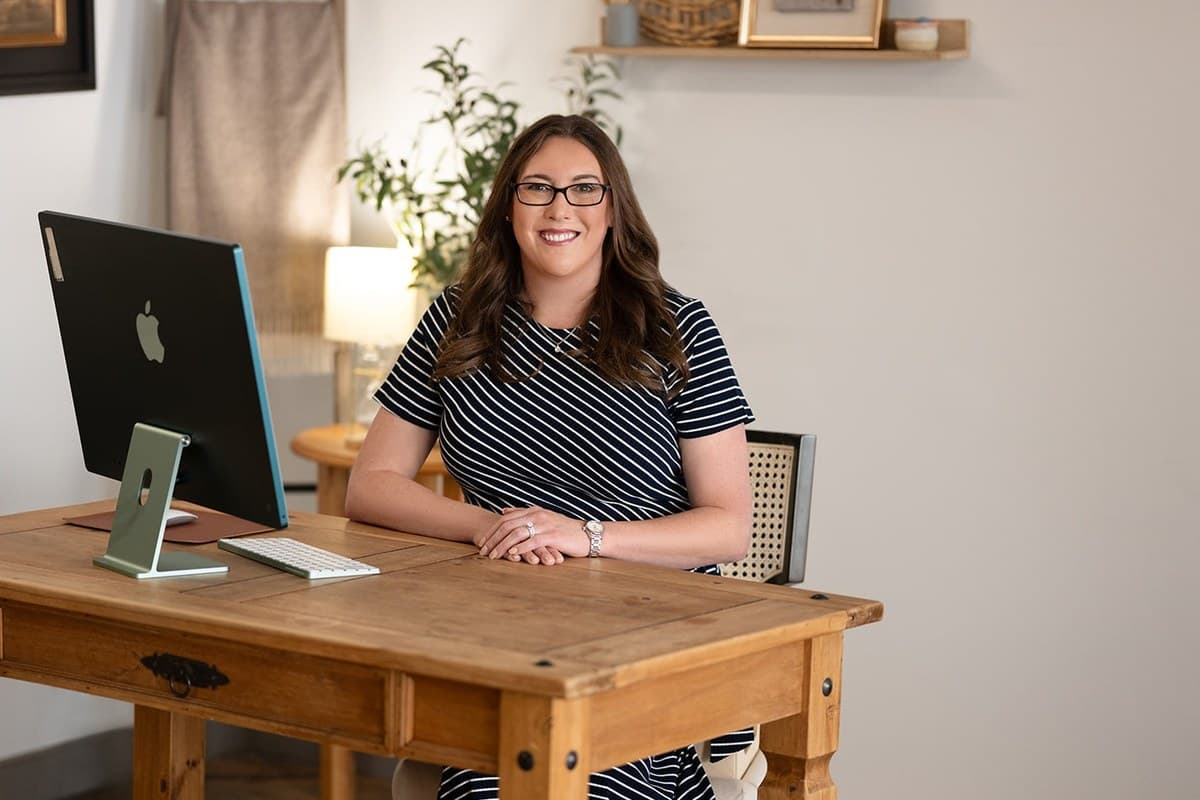 Kerry Gustafson at her desk, ready to hear about your career